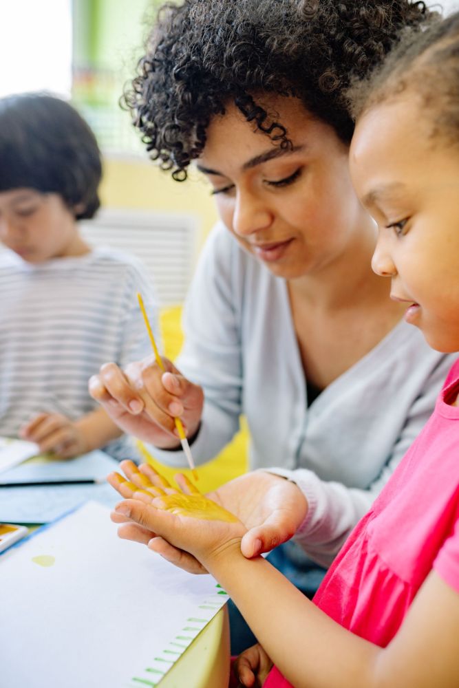 Finger painting activity at Blooming Branches Daycare, Landover MD
